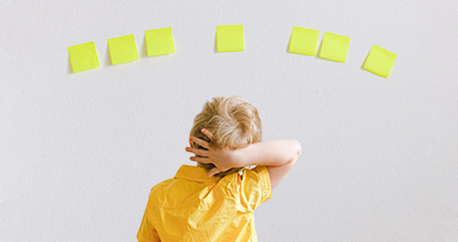 My Child Is Struggling: How Do I Get An IEP Assessment/Evaluation And IEP?, image of a kid looking at post-it notes unsure of what to pick