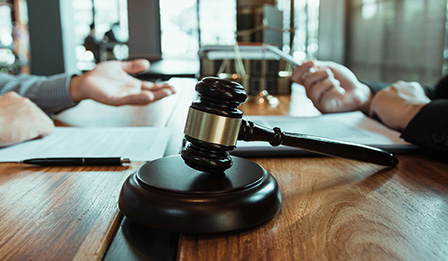 Family Law Support, image of family and legal items on a desk. 